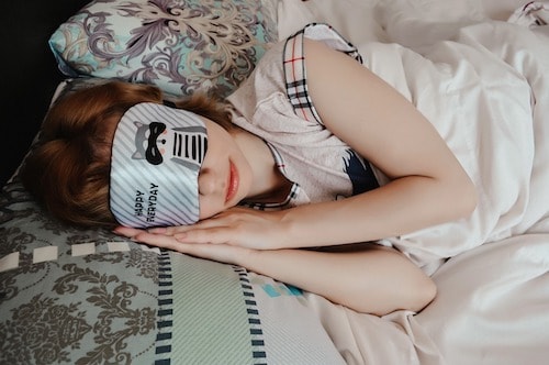 Sleep mask in bed